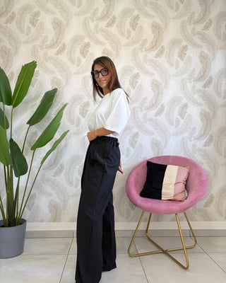 Pantalone allacciatura asimmetrica