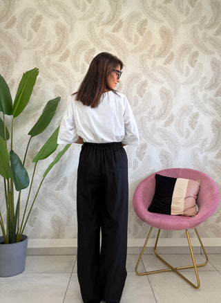 Pantalone allacciatura asimmetrica